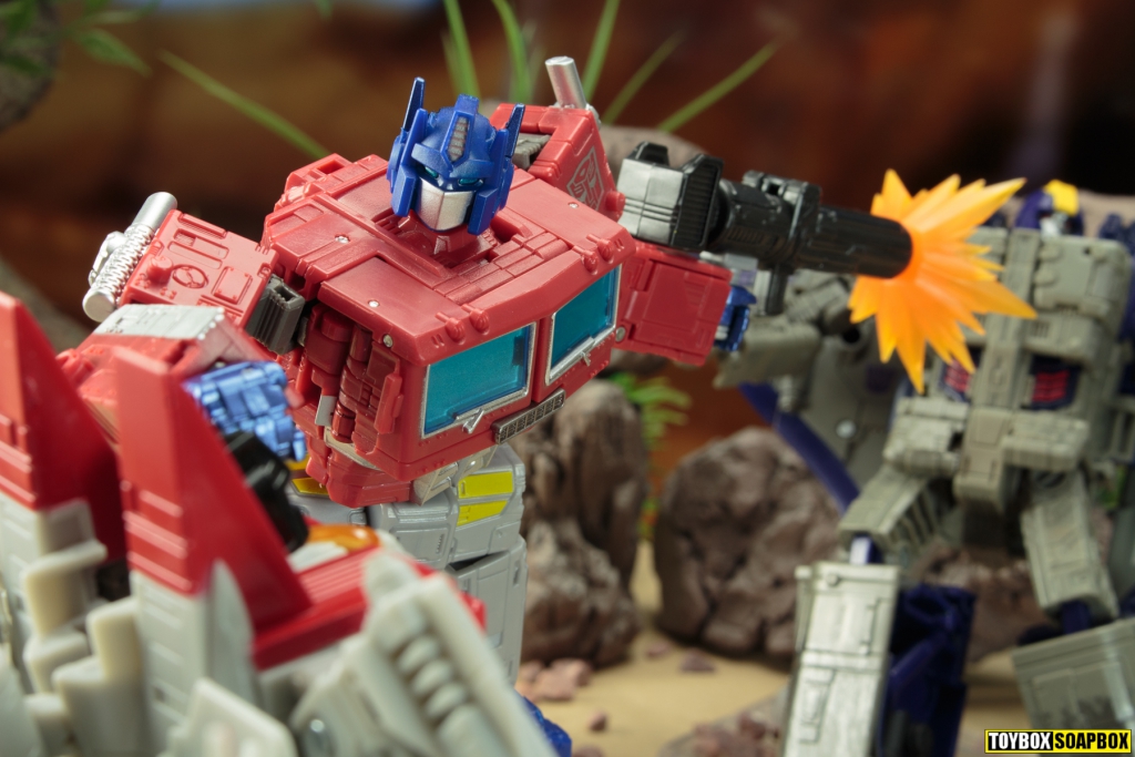 optimus prime blasts earthrise starscream and astrotrain