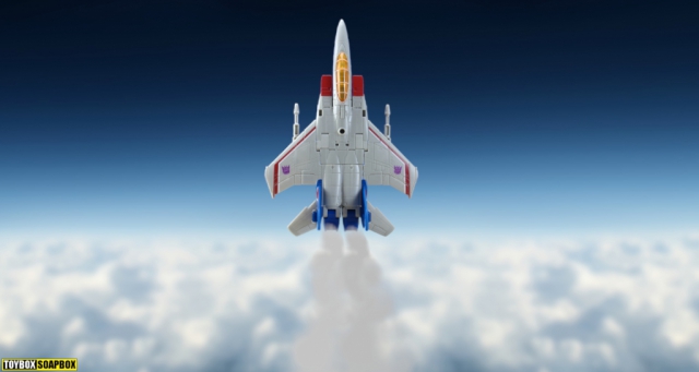 earthrise starscream jet bursting through clouds